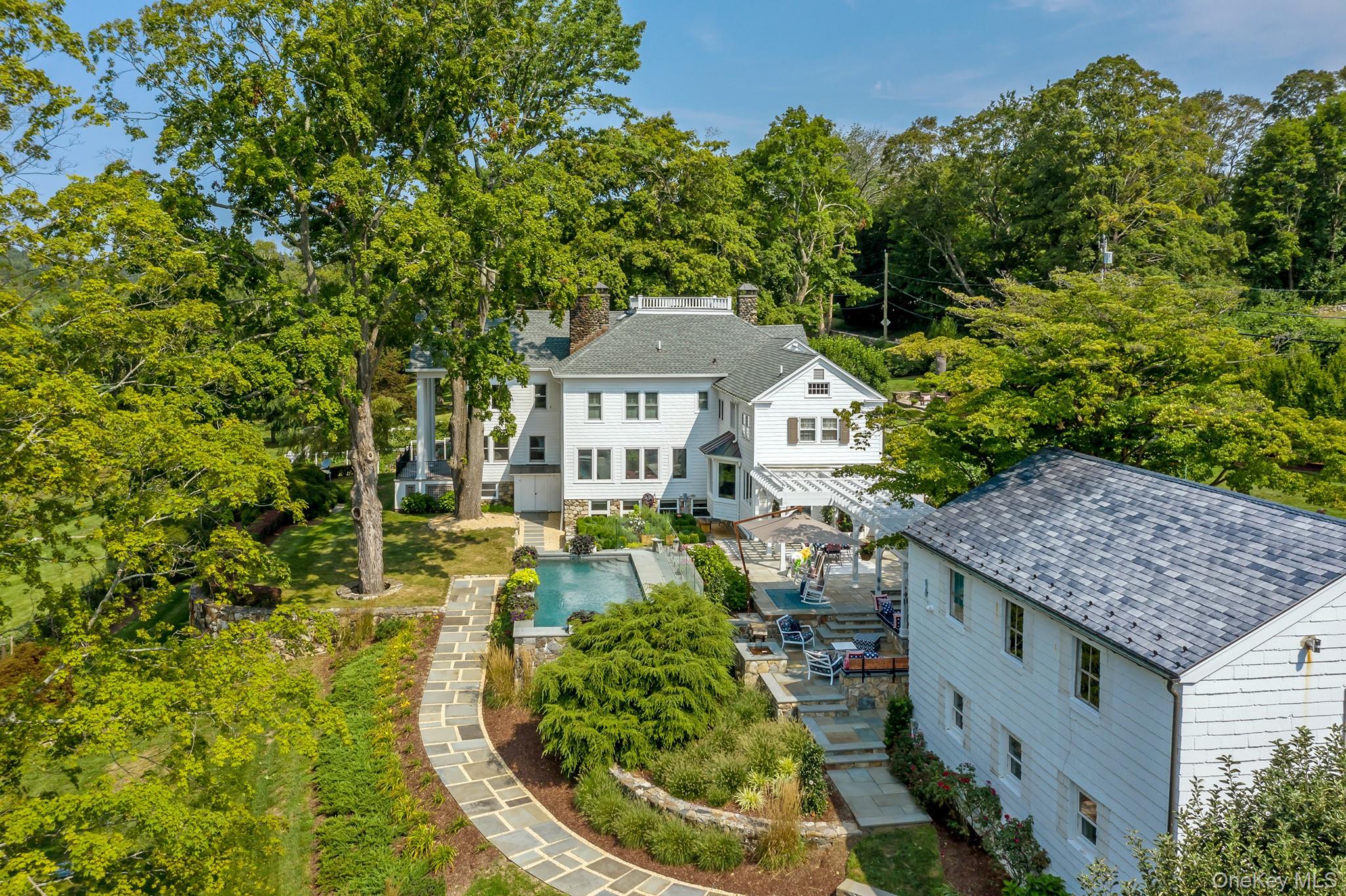 151-155 Long Ridge Road Danbury, CT 06810 - Photo 30 of 48 an aerial view of a house with a yard table and chairs