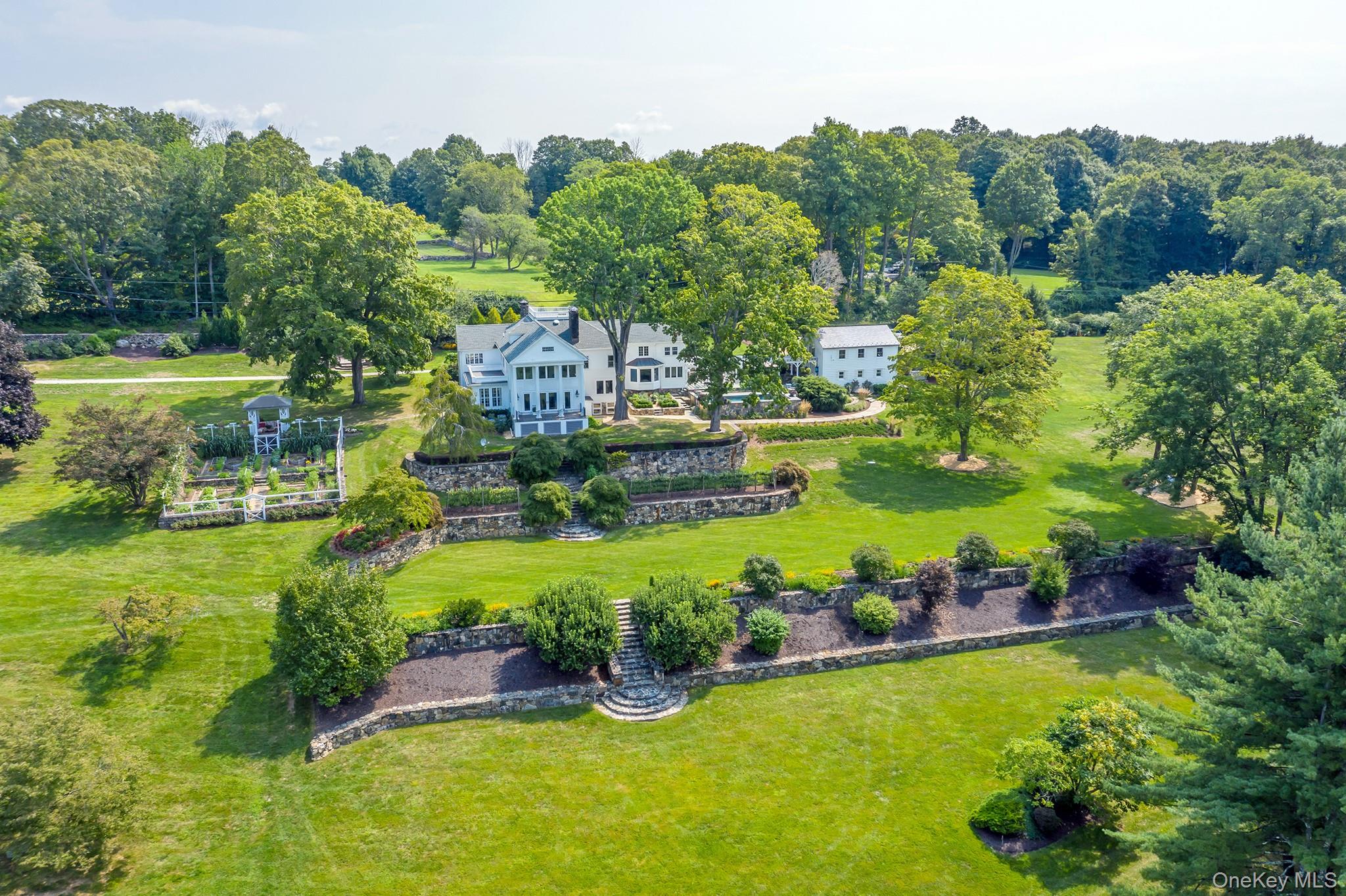 151-155 Long Ridge Road Danbury, CT 06810 - Photo 3 of 48 a view of a swimming pool with a yard