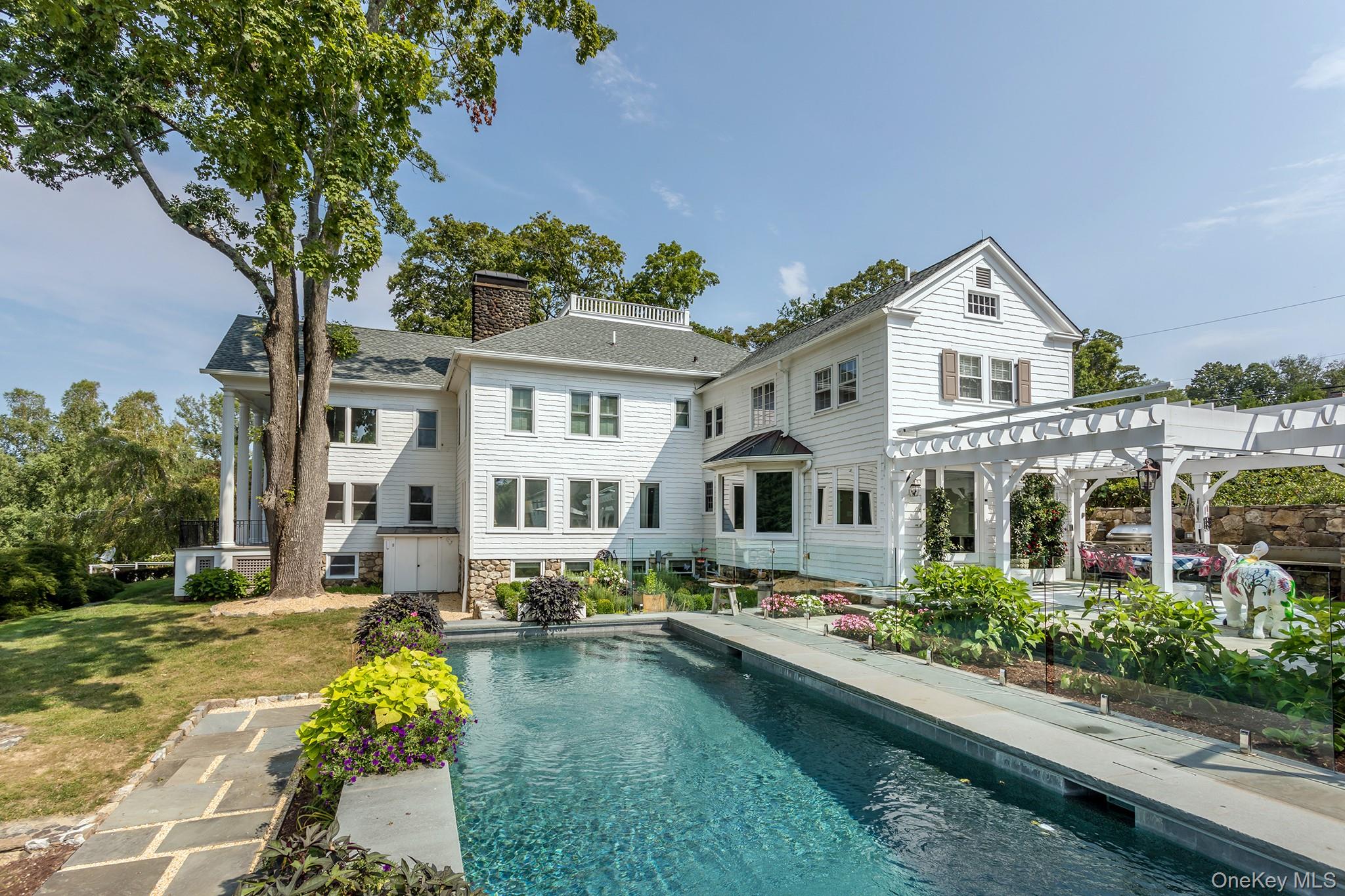 151-155 Long Ridge Road Danbury, CT 06810 - Photo 32 of 48 a front view of residential houses with yard and green space
