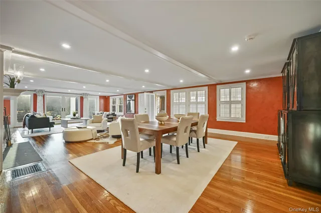 a view of balcony with wooden floor and a potted plant
