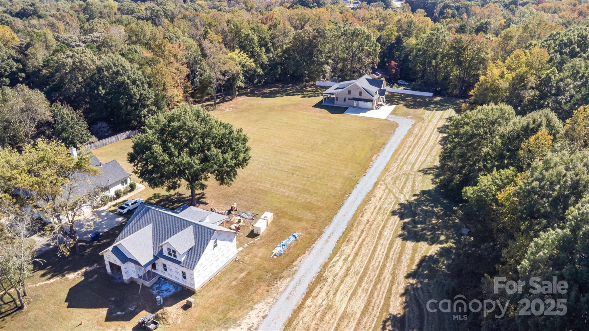 108 Jim Parker Road Wesley Chapel, NC 28110 - Photo 2 of 11 a view of a swimming pool with a yard