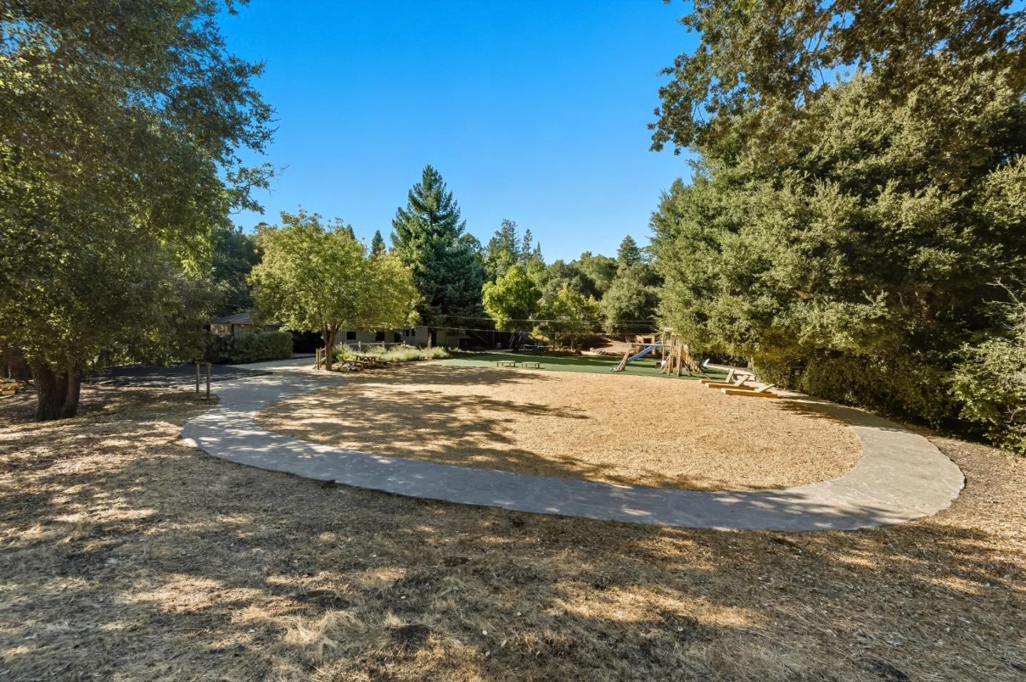 27464 Altamont Road Los Altos Hills, CA 94022 - Photo 27 of 29 a view of a yard with a house
