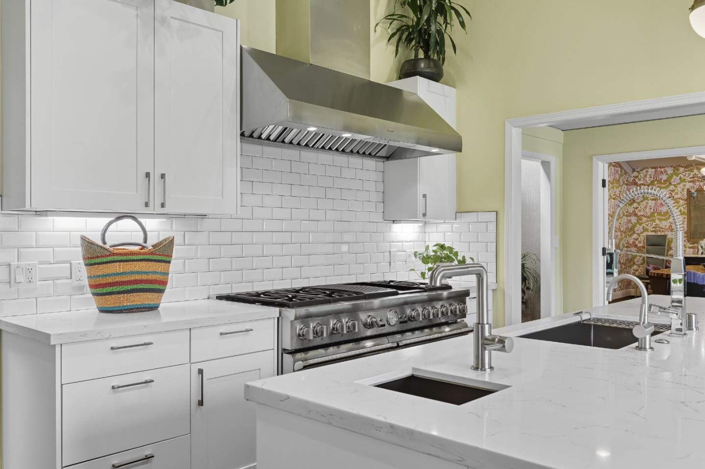 27464 Altamont Road Los Altos Hills, CA 94022 - Photo 8 of 29 a kitchen with a stove and a white cabinets