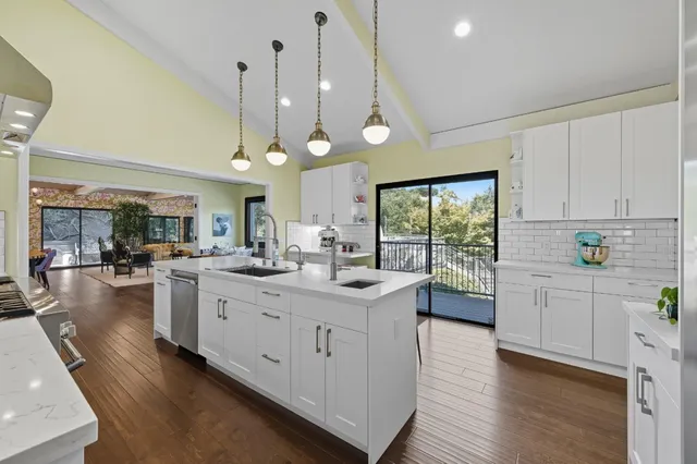 a dining room with furniture and wooden floor