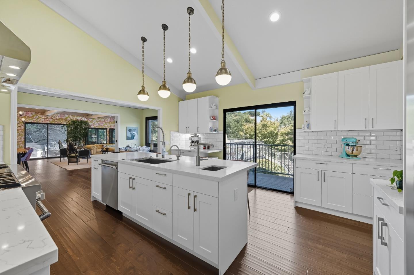 27464 Altamont Road Los Altos Hills, CA 94022 - Photo 9 of 29 a kitchen with counter top space sink and wooden floor