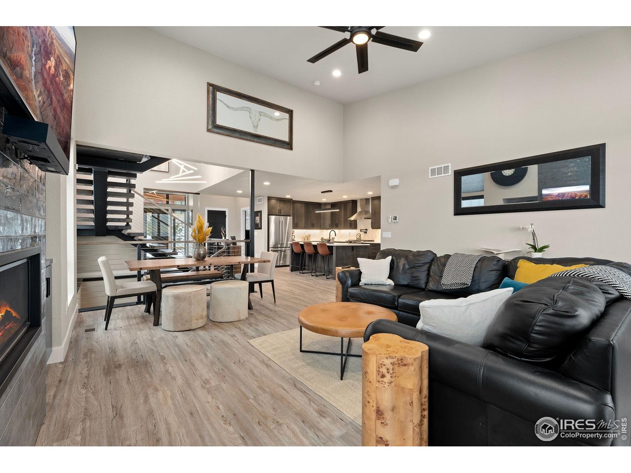 2089 Picture Point Drive Windsor, CO 80550 - Photo 13 of 45 a living room with furniture and a fireplace