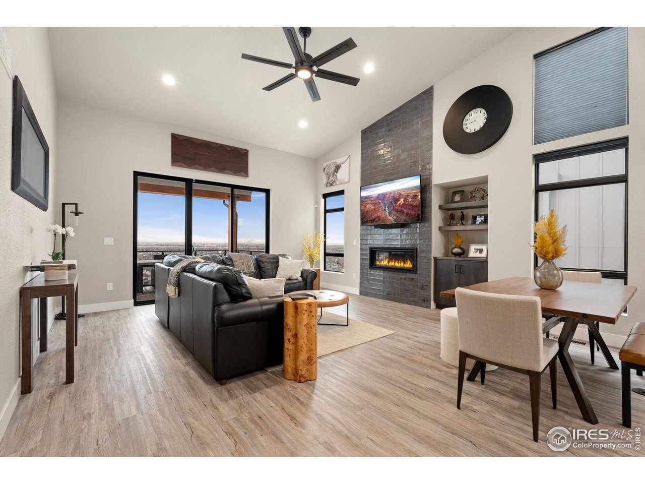 2089 Picture Point Drive Windsor, CO 80550 - Photo 14 of 45 a living room with furniture and a fireplace