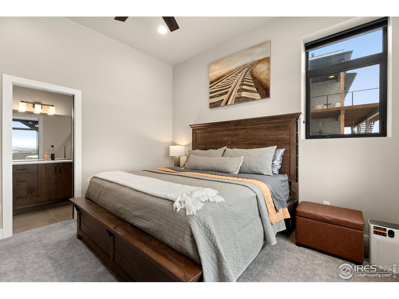 2089 Picture Point Drive Windsor, CO 80550 - Photo 28 of 45 a bedroom with a bed and a view of kitchen