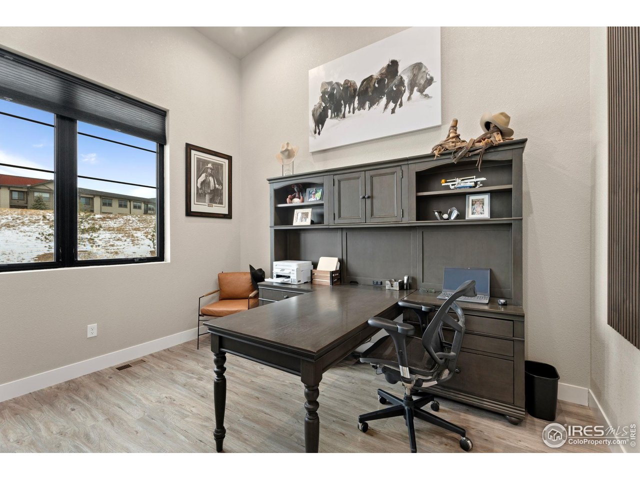 2089 Picture Point Drive Windsor, CO 80550 - Photo 6 of 45 a view of a workspace with furniture