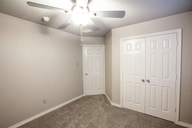 a view of a small space with a fan