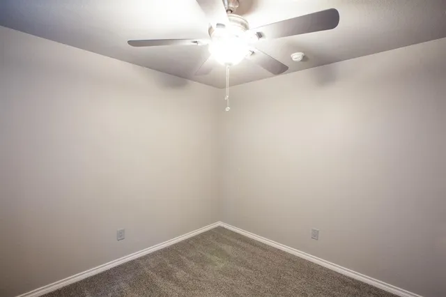 a view of a hallway with closet area