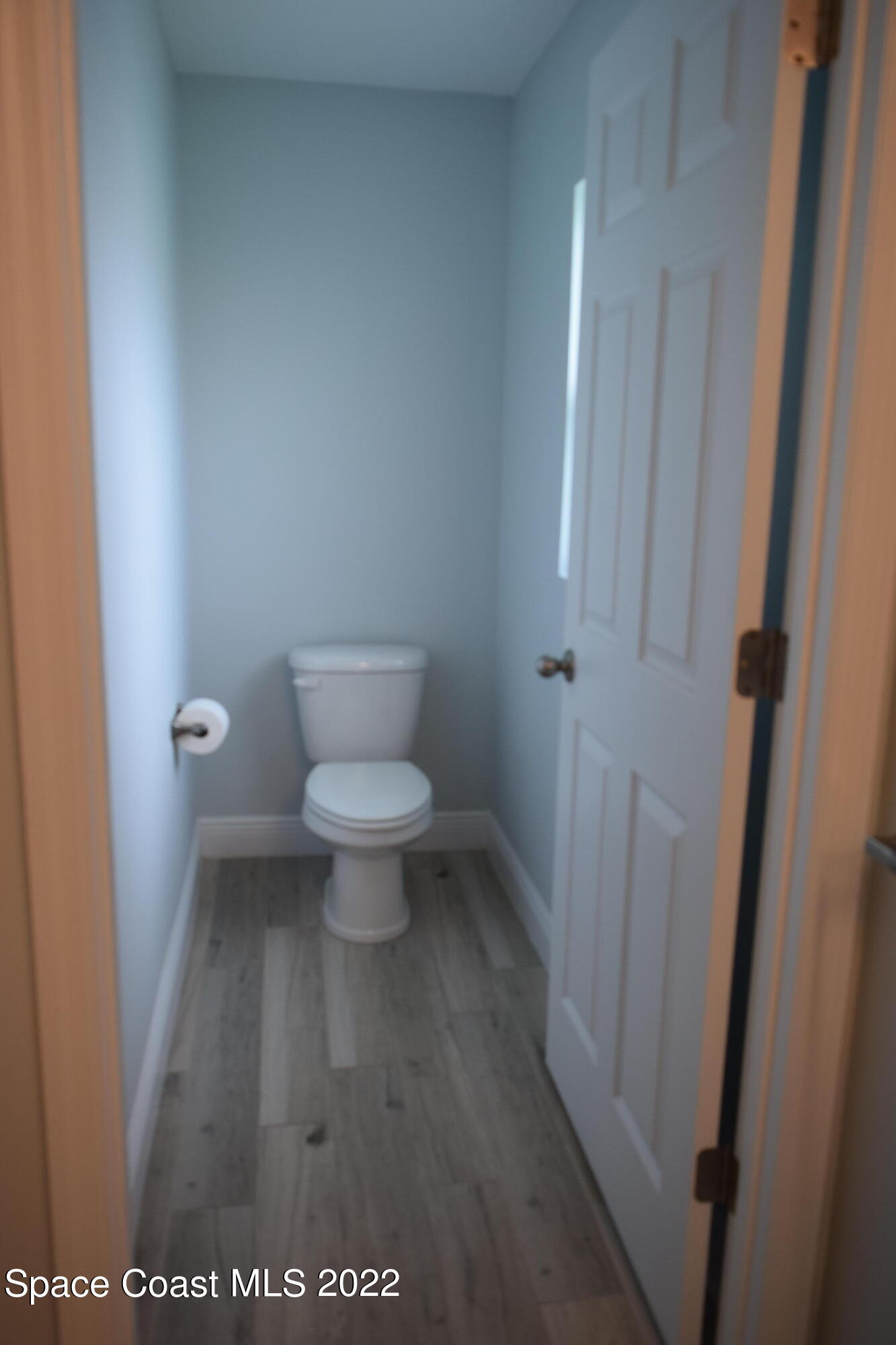 1328 Hazel Street Northwest Palm Bay, FL 32907 - Photo 11 of 28 a bathroom with a toilet and a shower