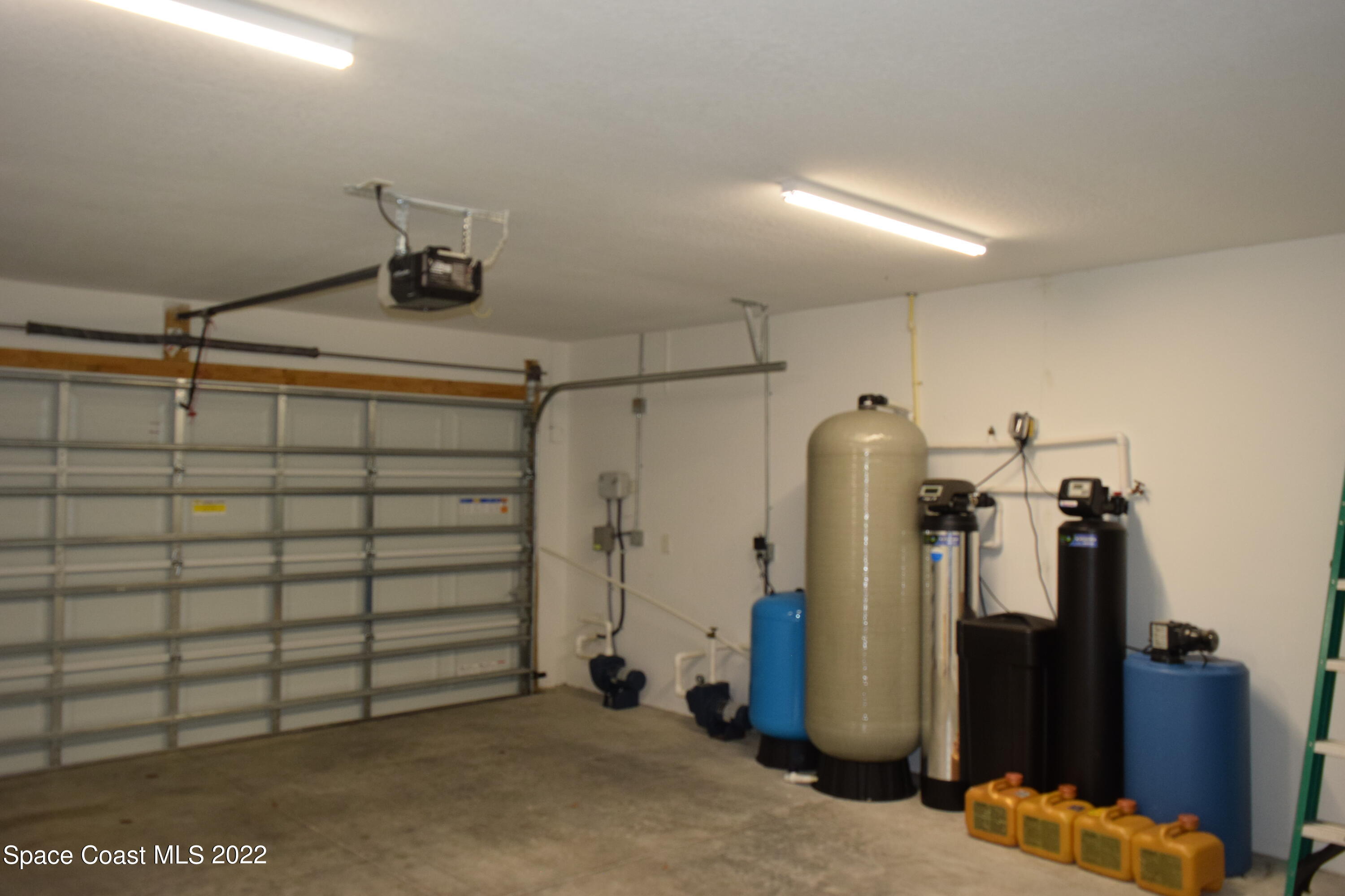 1328 Hazel Street Northwest Palm Bay, FL 32907 - Photo 23 of 28 a view of a garage