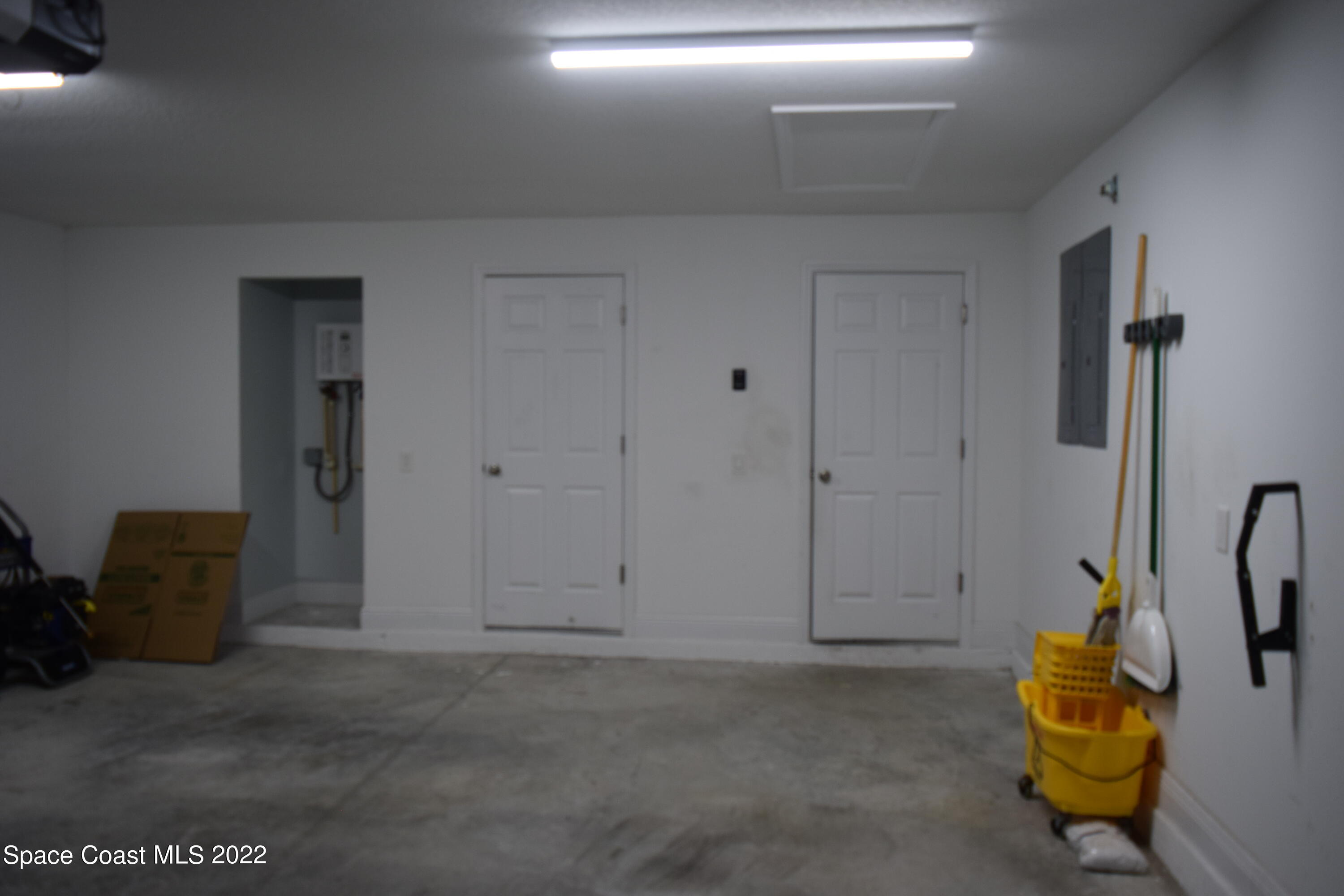 1328 Hazel Street Northwest Palm Bay, FL 32907 - Photo 24 of 28 a view of a storage & utility room