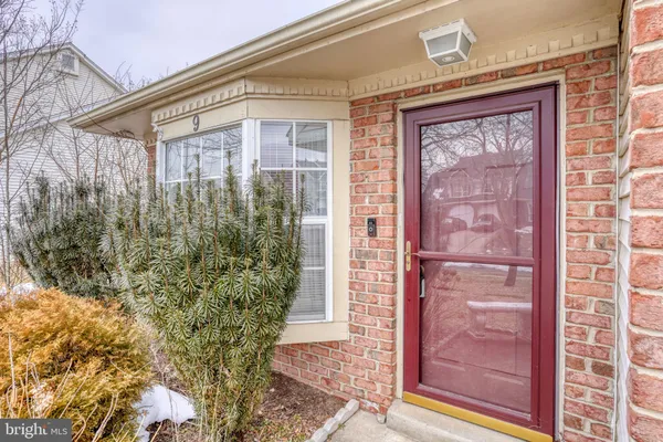 a front view of a house with a glass door