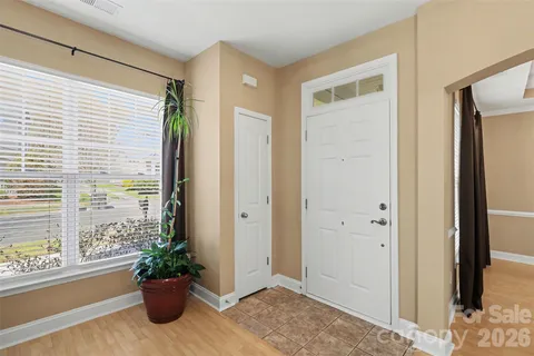 a view of an entryway with a flower pot