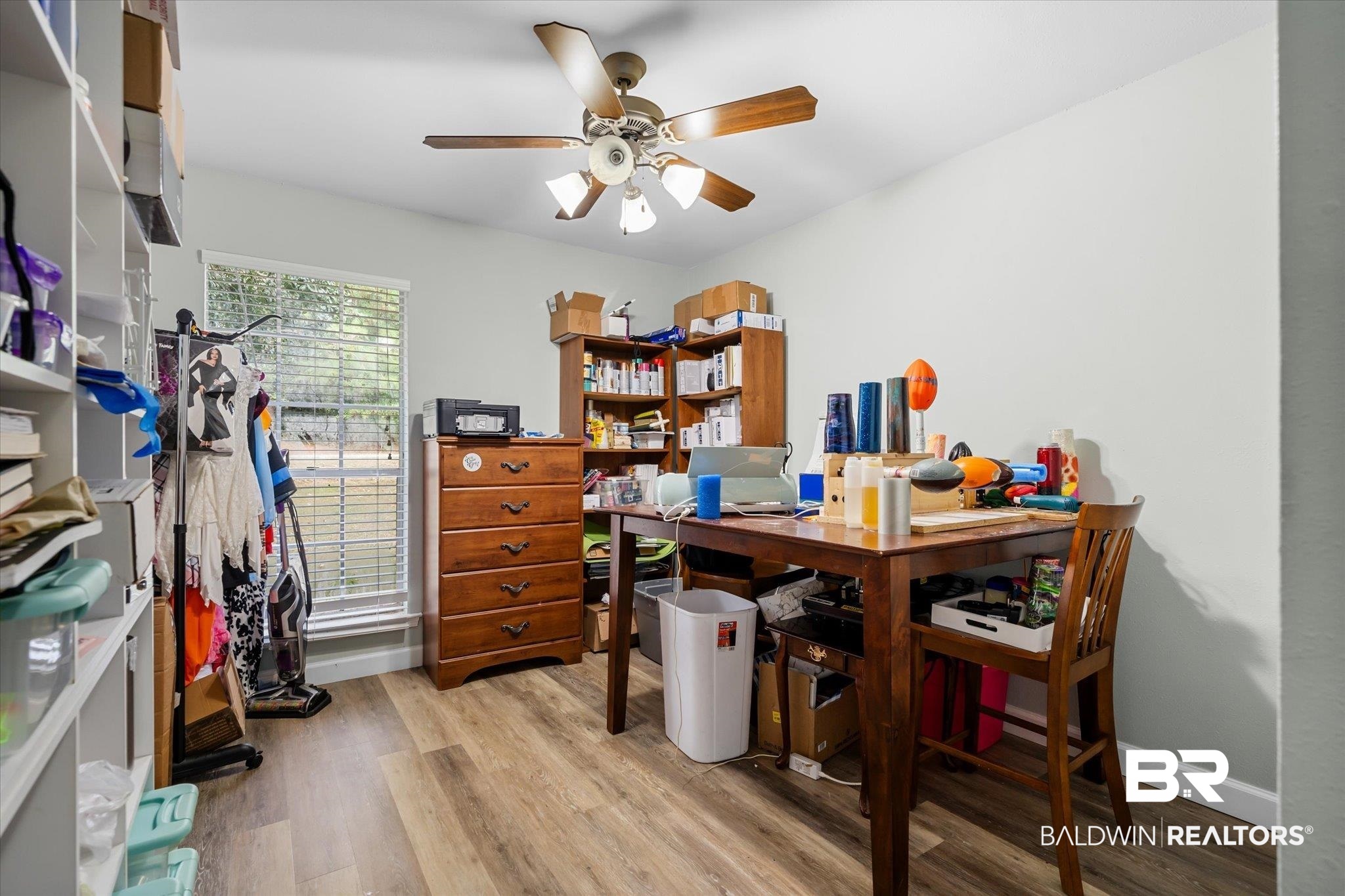 9987 Downing Street Semmes, AL 36575 - Photo 15 of 20 Home office with ceiling fan and light hardwood / wood-style flooring