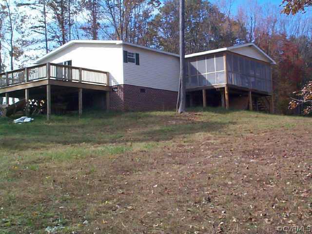 1744 Piney Green Road Crewe, VA 23930 - Photo 1 of 1 a view of a house with a yard and sitting area