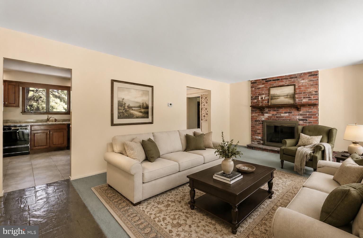 108 Sheeder Road Phoenixville, PA 19460 - Photo 4 of 42 a living room with furniture a rug and a fireplace