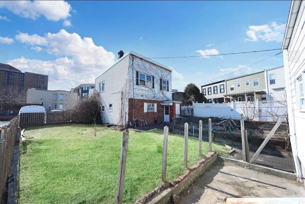 117 Hackensack Plank Road Weehawken, NJ 07086 - Photo 15 of 18 a view of a house with backyard and sitting area