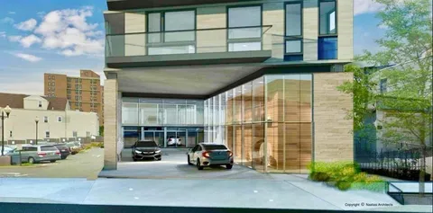 a car parked in front of a building