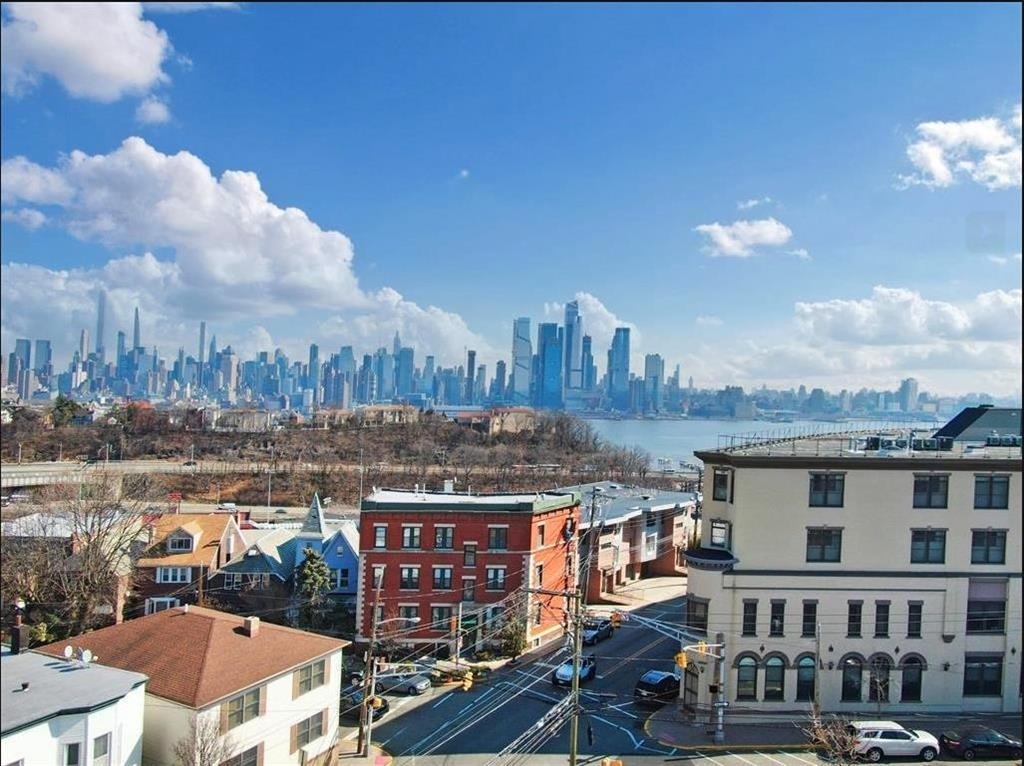 117 Hackensack Plank Road Weehawken, NJ 07086 - Photo 6 of 18 a city view with lot of high rise buildings
