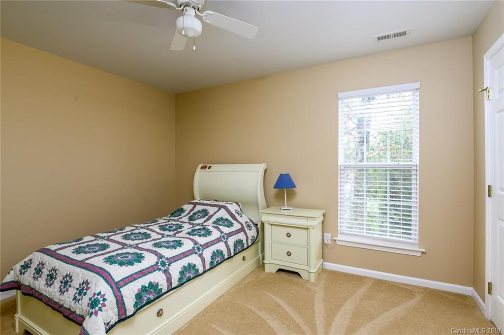 635 Eaton Court Fort Mill, SC 29708 - Photo 17 of 28 a bedroom with a bed and a window