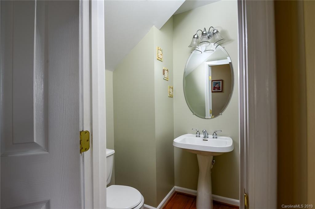 635 Eaton Court Fort Mill, SC 29708 - Photo 24 of 28 a bathroom with a toilet sink and mirror
