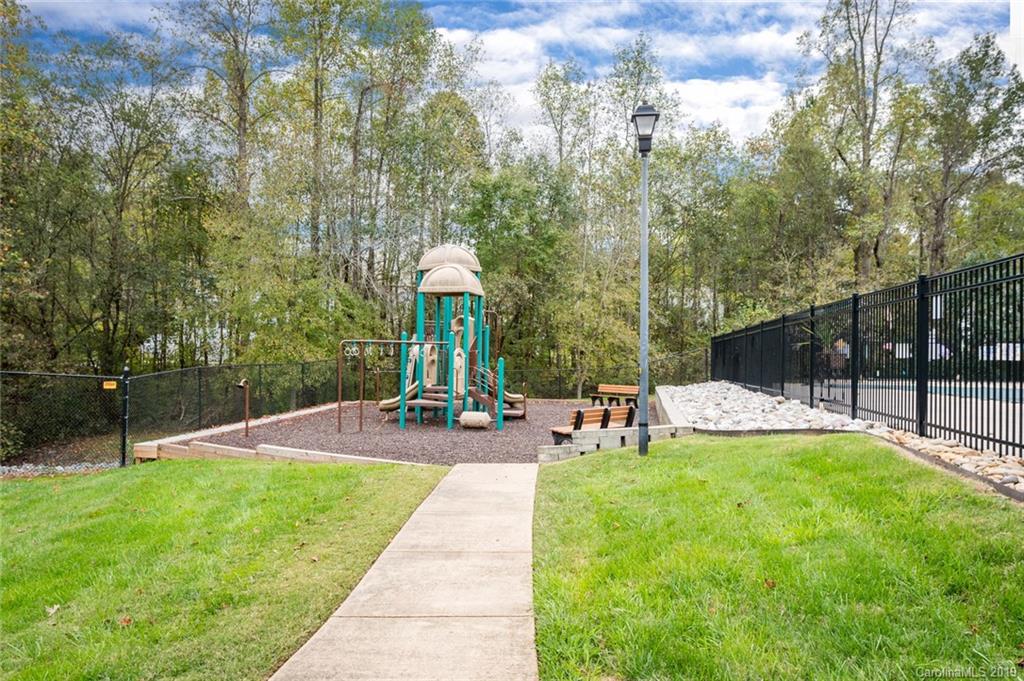 635 Eaton Court Fort Mill, SC 29708 - Photo 26 of 28 a view of a backyard with sitting area