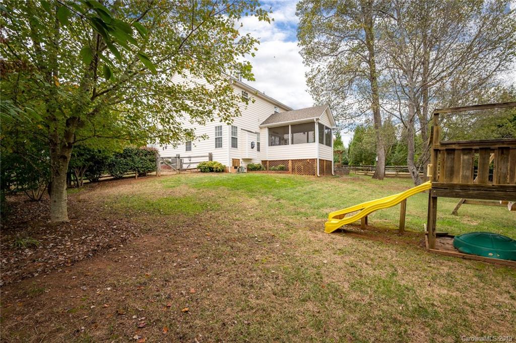 635 Eaton Court Fort Mill, SC 29708 - Photo 4 of 28 a view of a house with a yard and sitting area