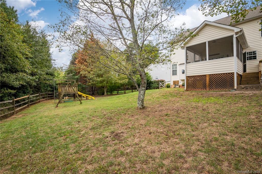 635 Eaton Court Fort Mill, SC 29708 - Photo 5 of 28 a view of a house with a backyard