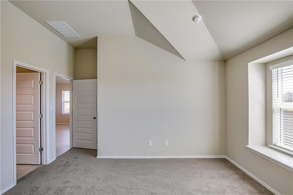 306 Delta Crest Maxwell, TX 78656 - Photo 14 of 24 an empty room with windows