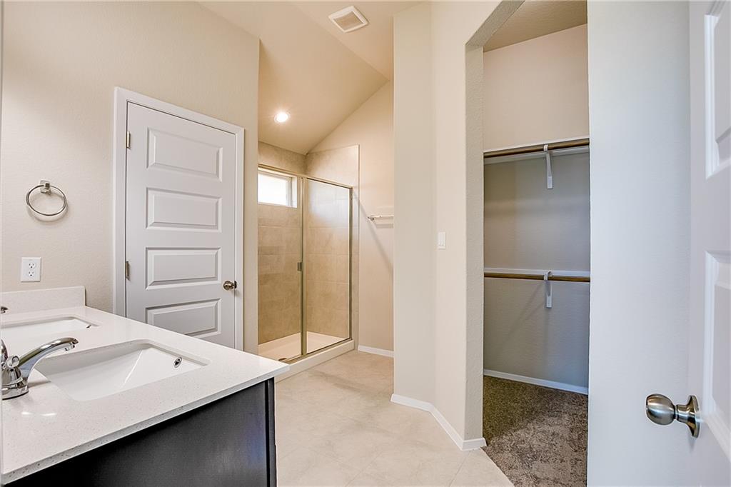 306 Delta Crest Maxwell, TX 78656 - Photo 15 of 24 a bathroom with a sink and mirror