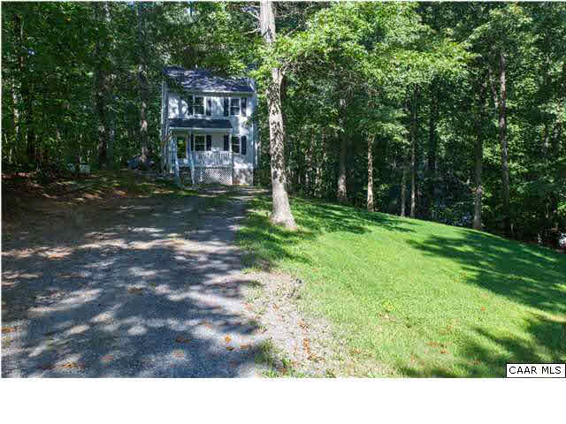89 West Daffodil Road Ruckersville, VA 22968 - Photo 16 of 22 a view of a house with a yard