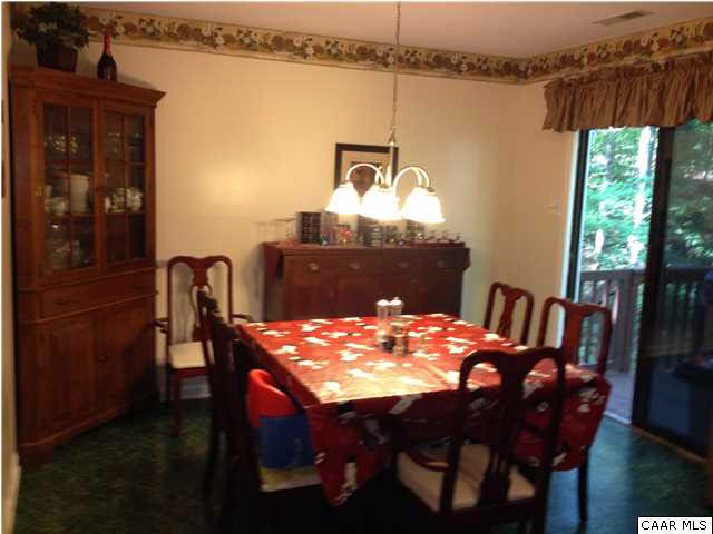 89 West Daffodil Road Ruckersville, VA 22968 - Photo 5 of 22 a dining table with chairs and window