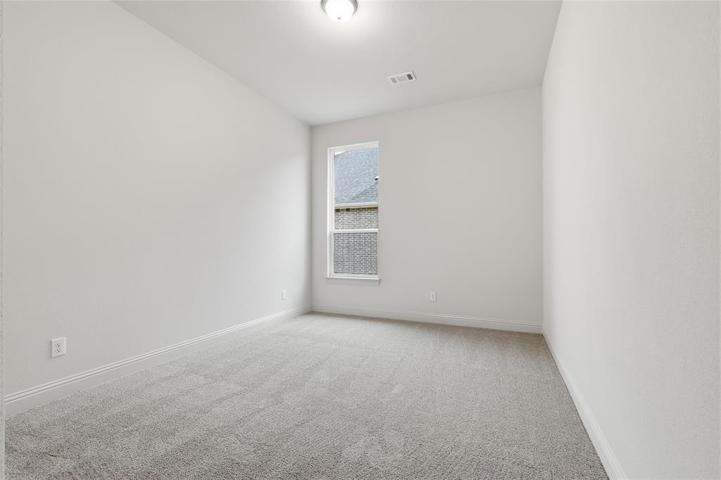 556 Flint Road Waxahachie, TX 75167 - Photo 11 of 39 a view of an empty room