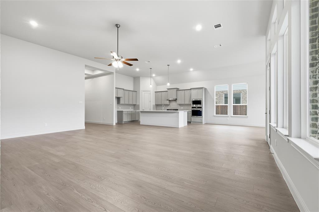 556 Flint Road Waxahachie, TX 75167 - Photo 16 of 39 a view of a kitchen with a sink and an cabinet
