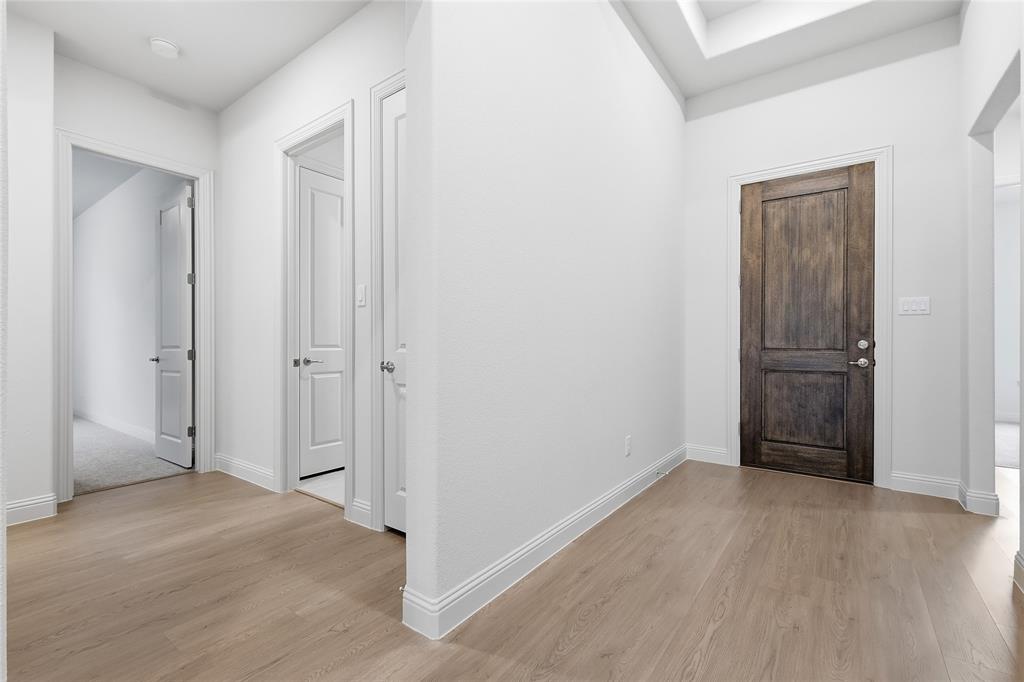 556 Flint Road Waxahachie, TX 75167 - Photo 2 of 39 a view of entryway with wooden floor