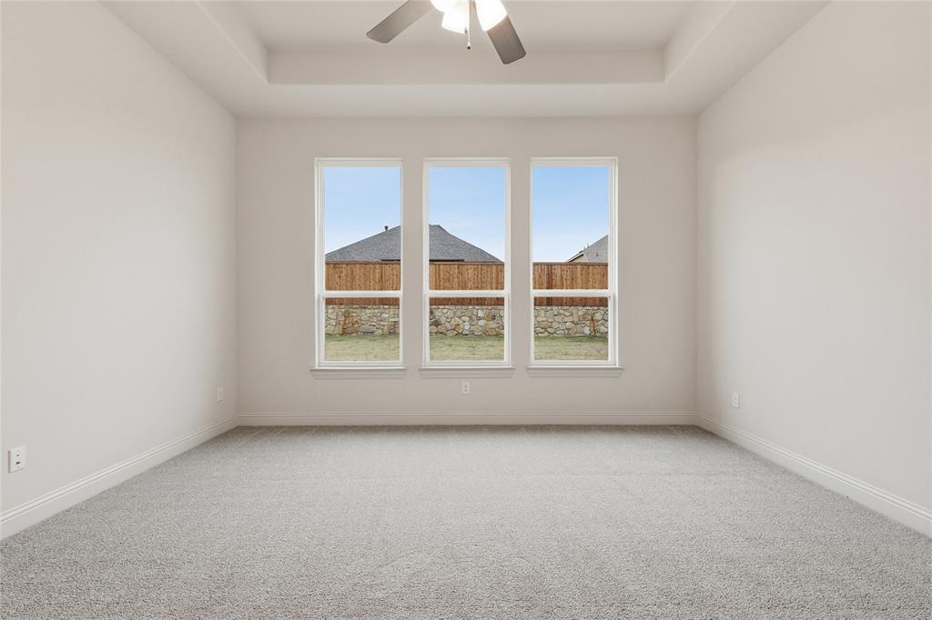 556 Flint Road Waxahachie, TX 75167 - Photo 24 of 39 an empty room with a window
