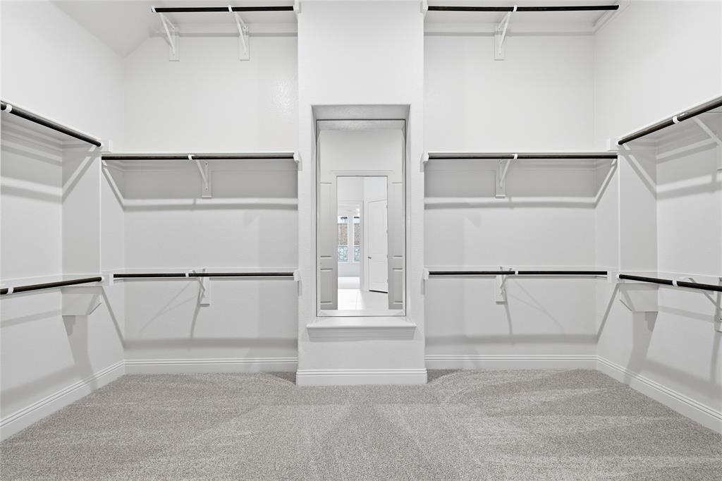 556 Flint Road Waxahachie, TX 75167 - Photo 30 of 39 a view of an empty walk in closet