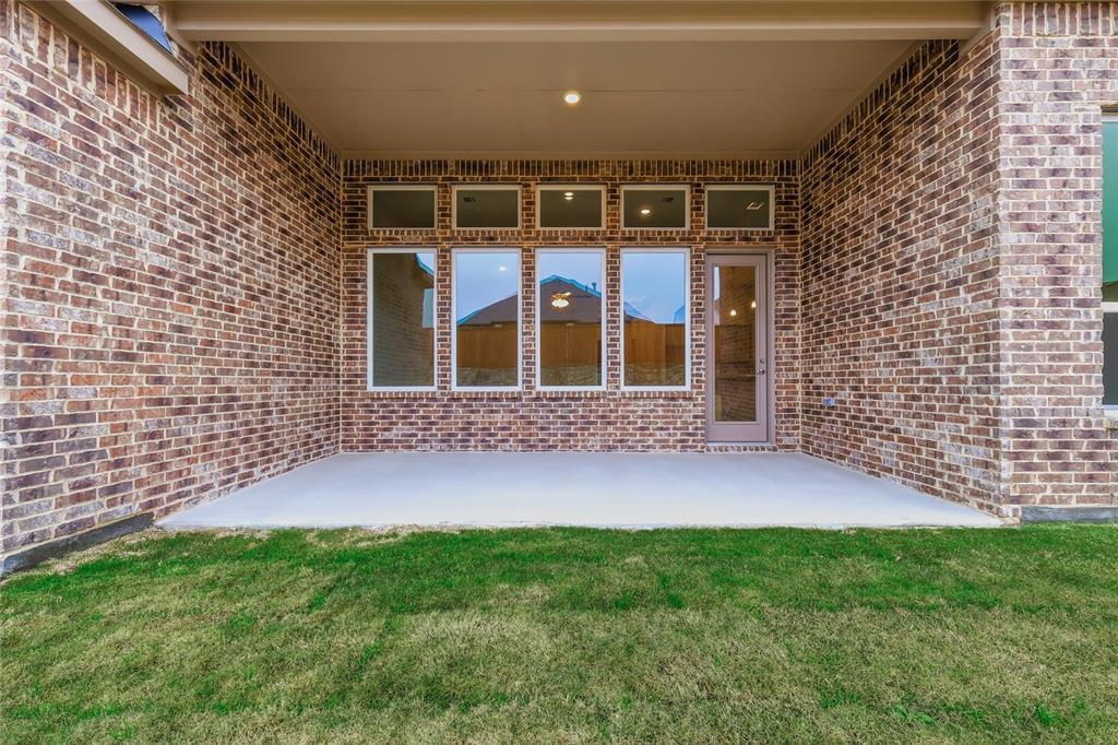 556 Flint Road Waxahachie, TX 75167 - Photo 33 of 39 a view of front door of house with green space