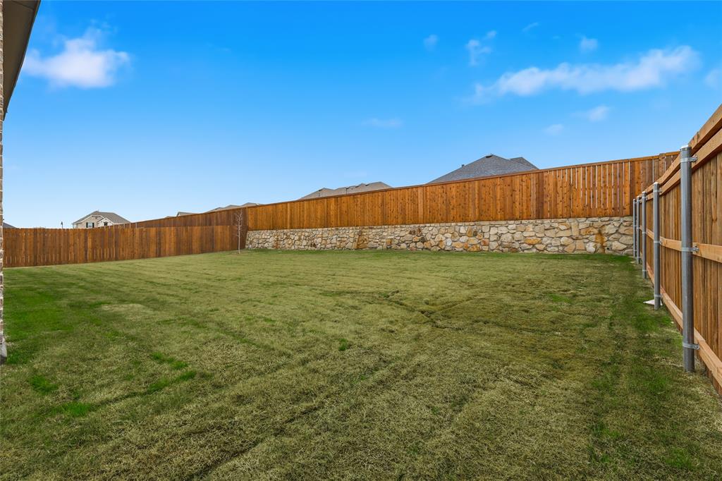 556 Flint Road Waxahachie, TX 75167 - Photo 36 of 39 a view of an outdoor space and a yard