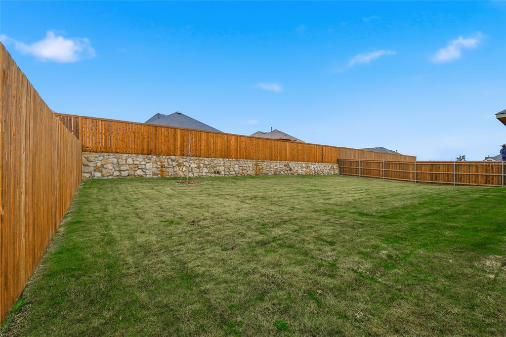 556 Flint Road Waxahachie, TX 75167 - Photo 37 of 39 a view of an outdoor space and a yard