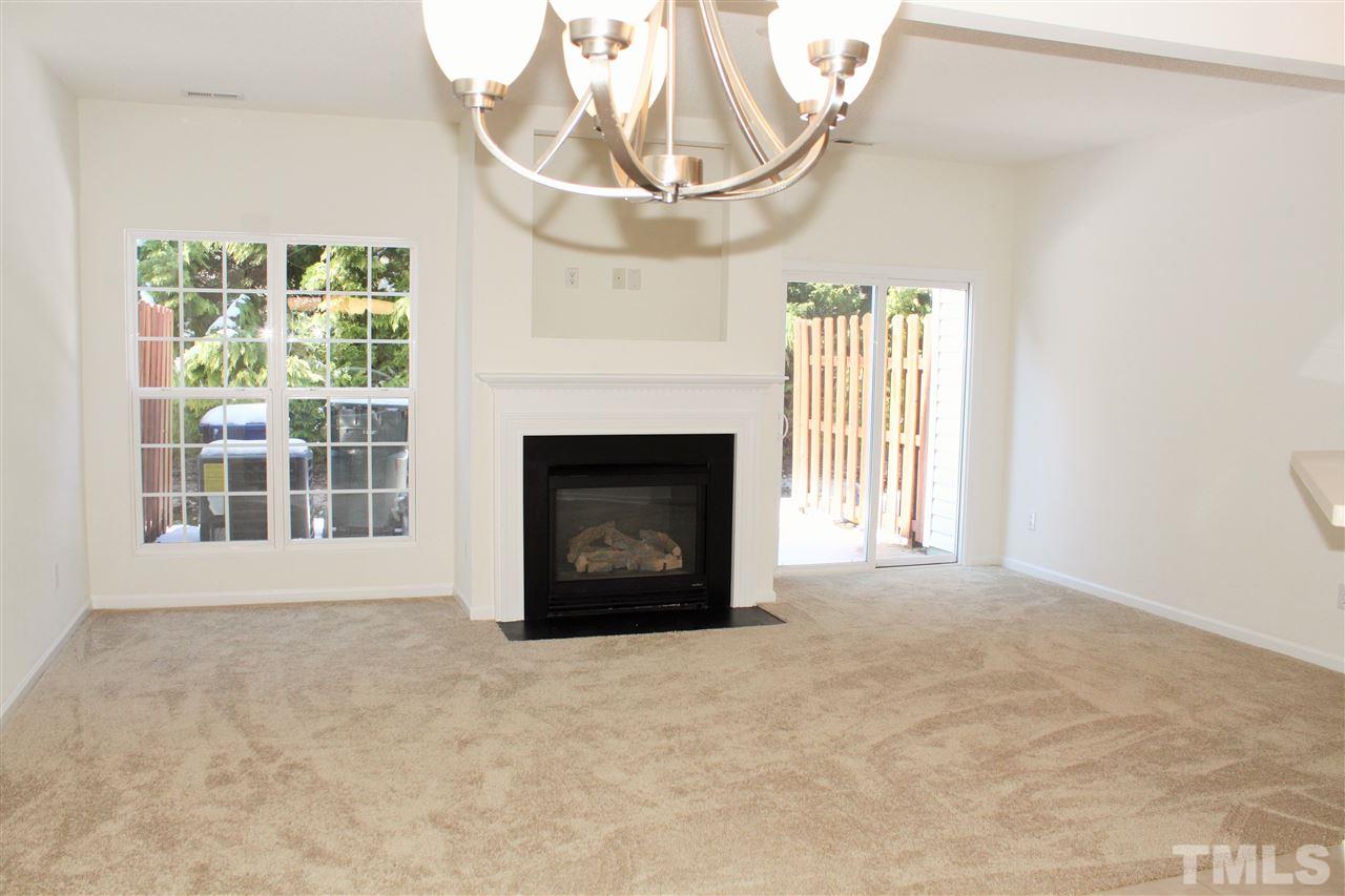 3043 Settle In Lane Raleigh, NC 27614 - Photo 1 of 19 a view of an empty room with a fireplace