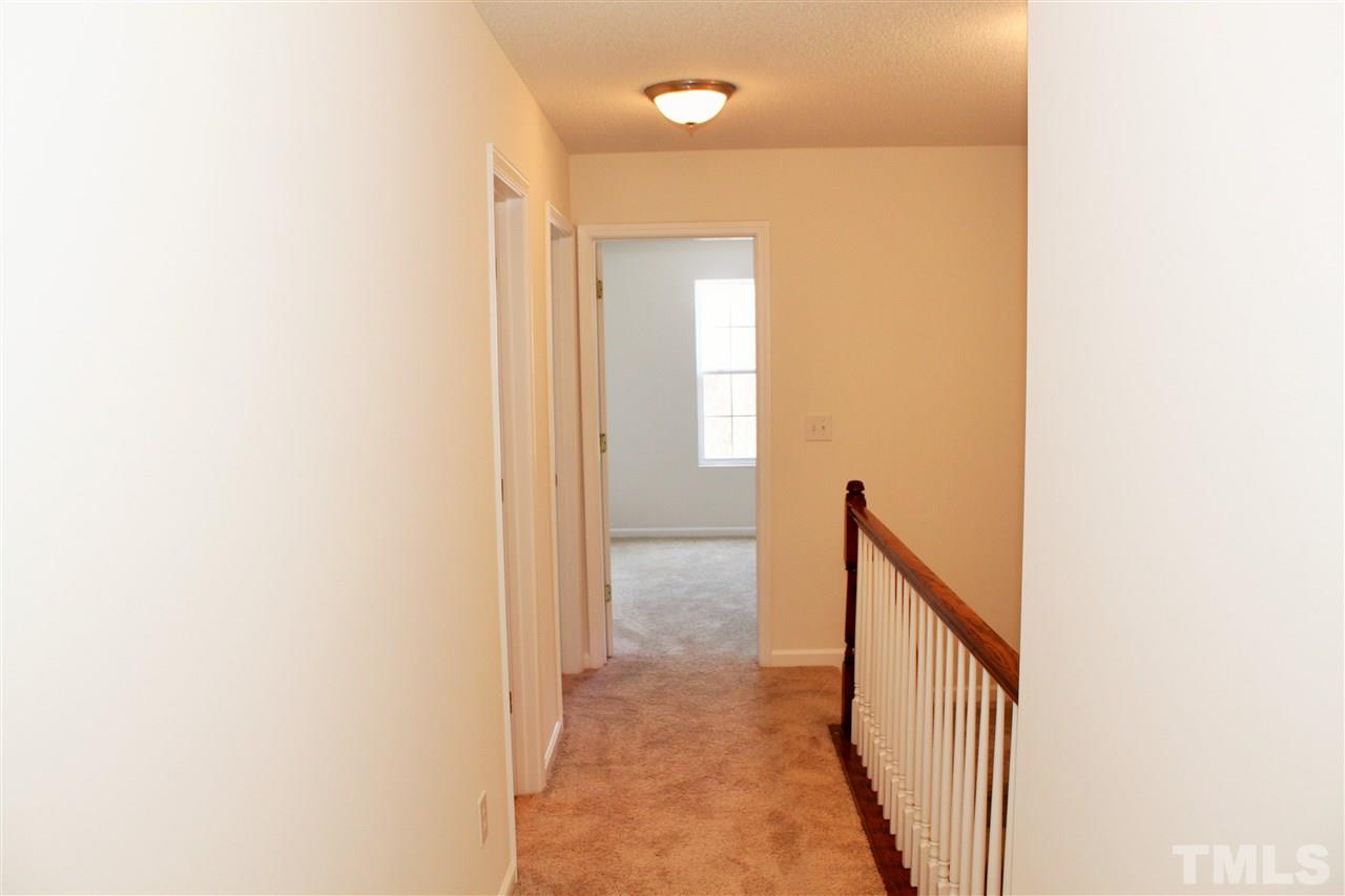 3043 Settle In Lane Raleigh, NC 27614 - Photo 16 of 19 a view of a hallway