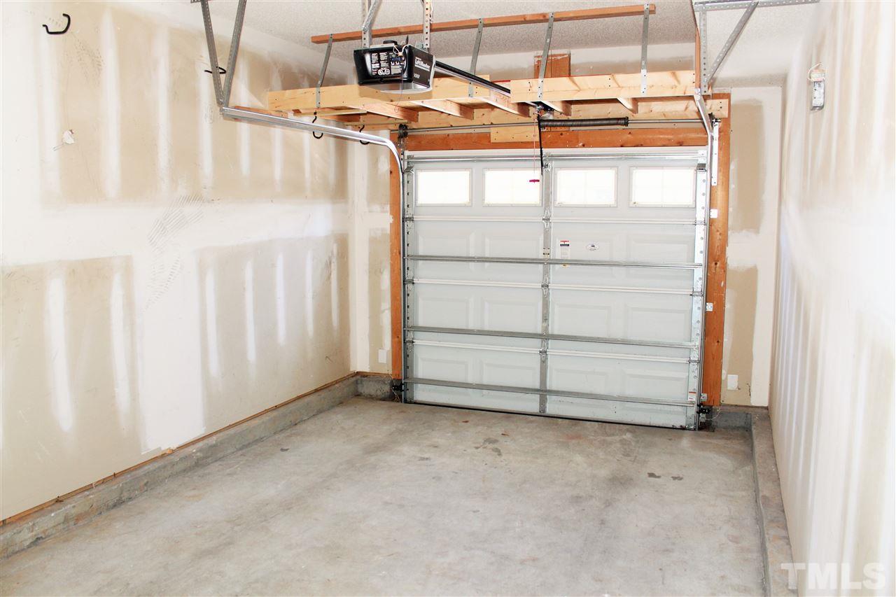 3043 Settle In Lane Raleigh, NC 27614 - Photo 19 of 19 a view of a house with a garage