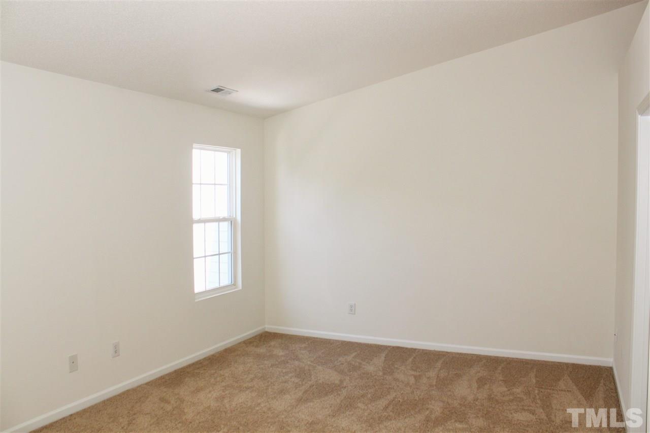 3043 Settle In Lane Raleigh, NC 27614 - Photo 9 of 19 an empty room with windows
