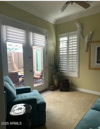 a living room with furniture and a window