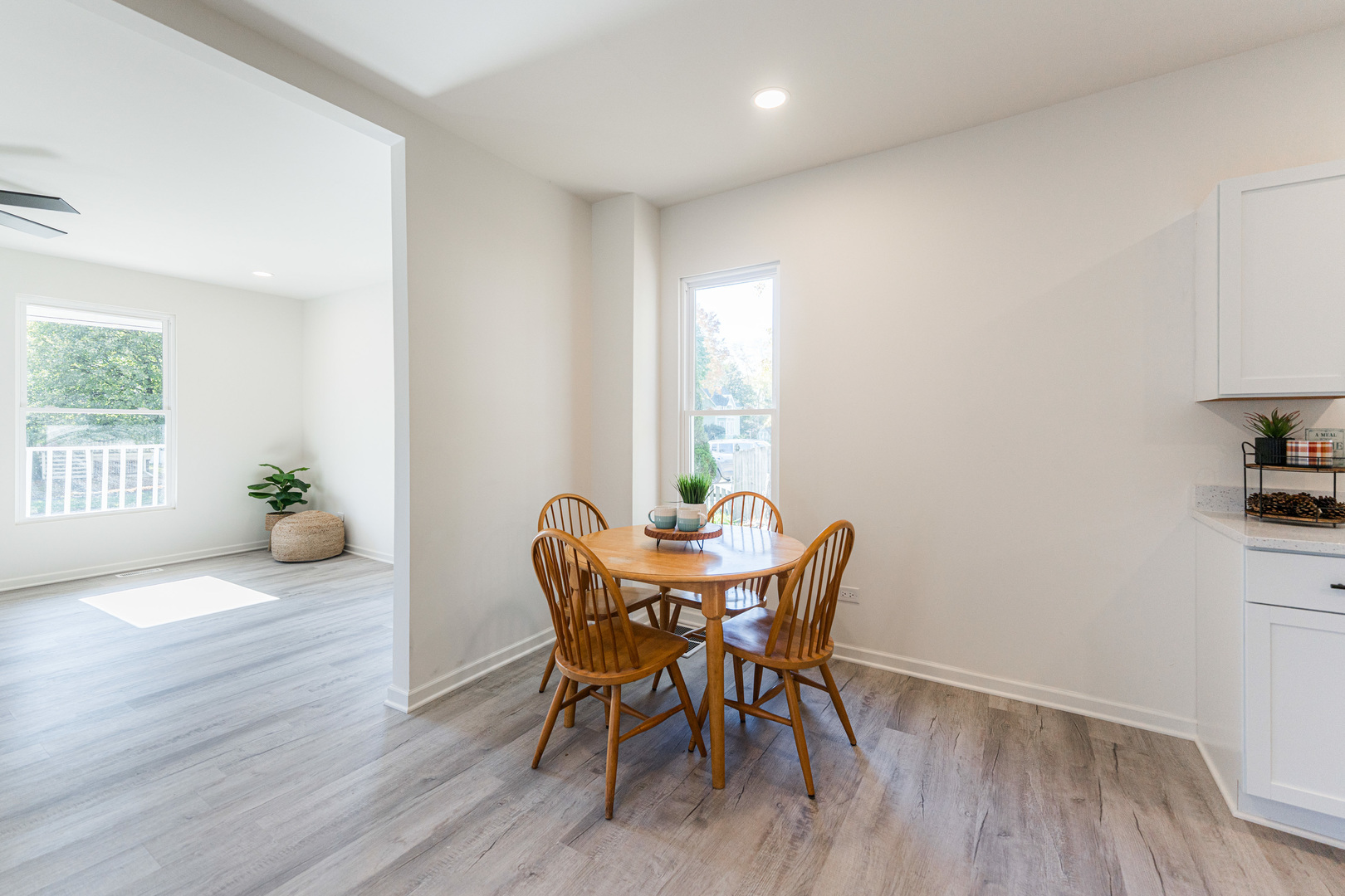 615 Prospect Street DeKalb, IL 60115 - Photo 11 of 27 a view of a dining room with furniture and wooden floor