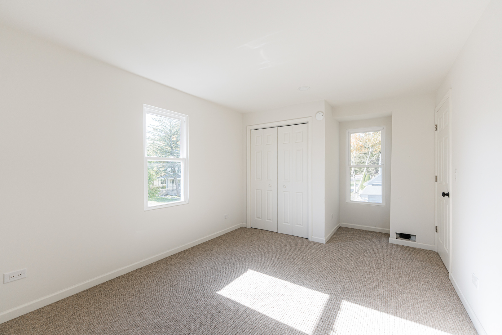 615 Prospect Street DeKalb, IL 60115 - Photo 18 of 27 an empty room with windows
